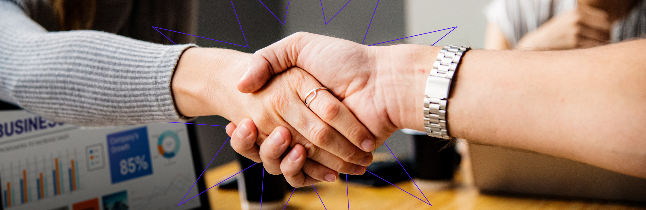 Two persons shaking hands
